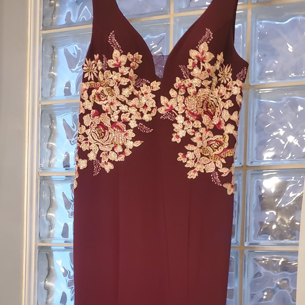 Xscape burgundy mermaid gown with embellished appliques sides